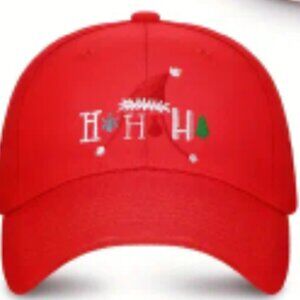 Festive Red Christmas cap with the saying "Ho ho ho" on the front with accents.